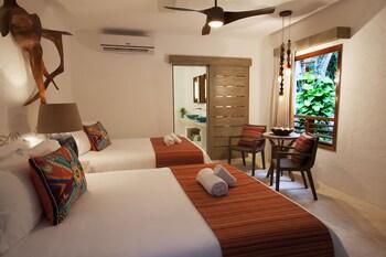 Shangri-la Caribe Beach Village Resort