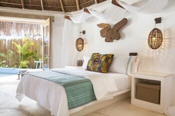 Shangri-la Caribe Beach Village Resort